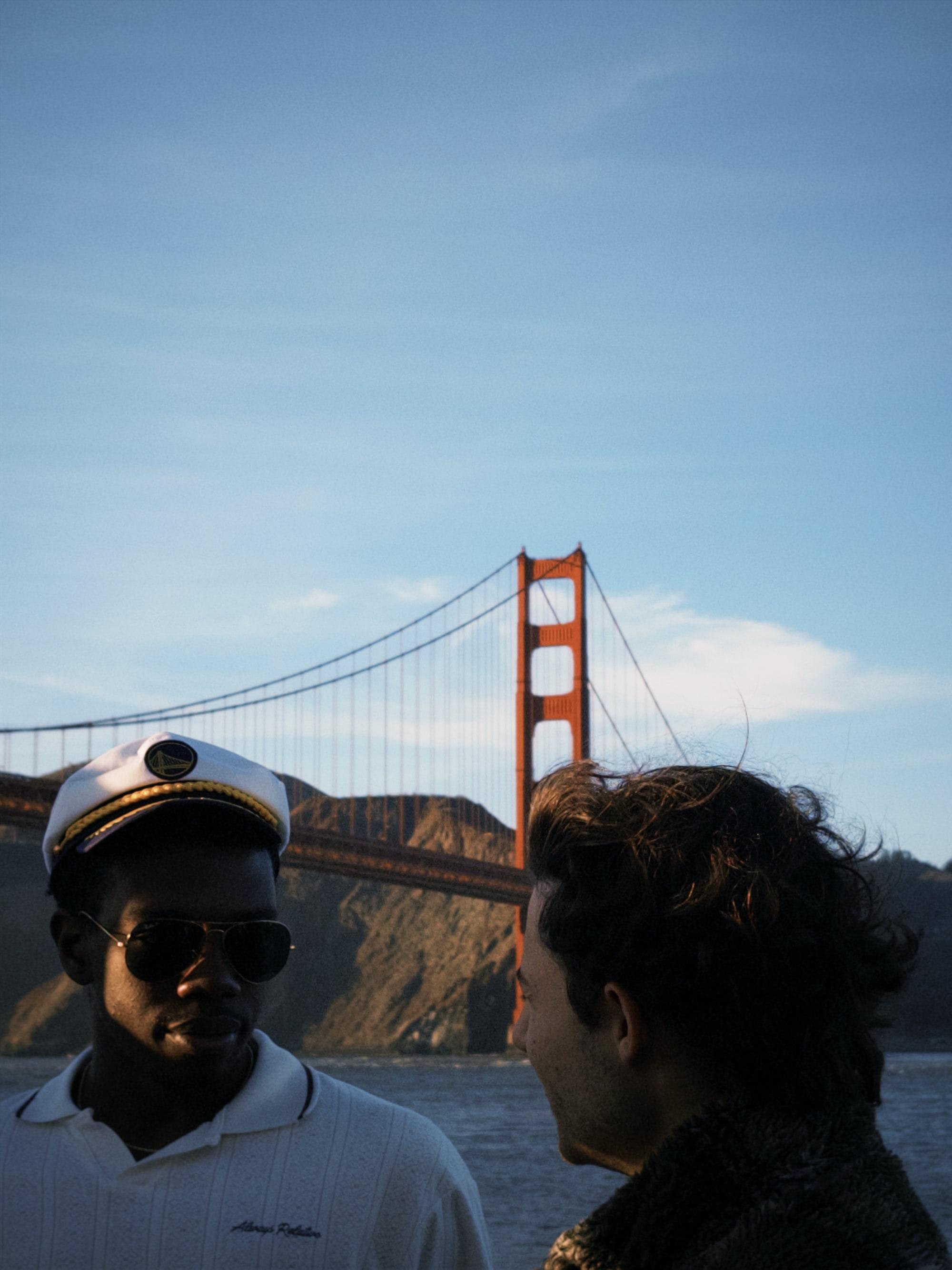 Talking with the captain on a boat in front of the Golden Gate Bridge
