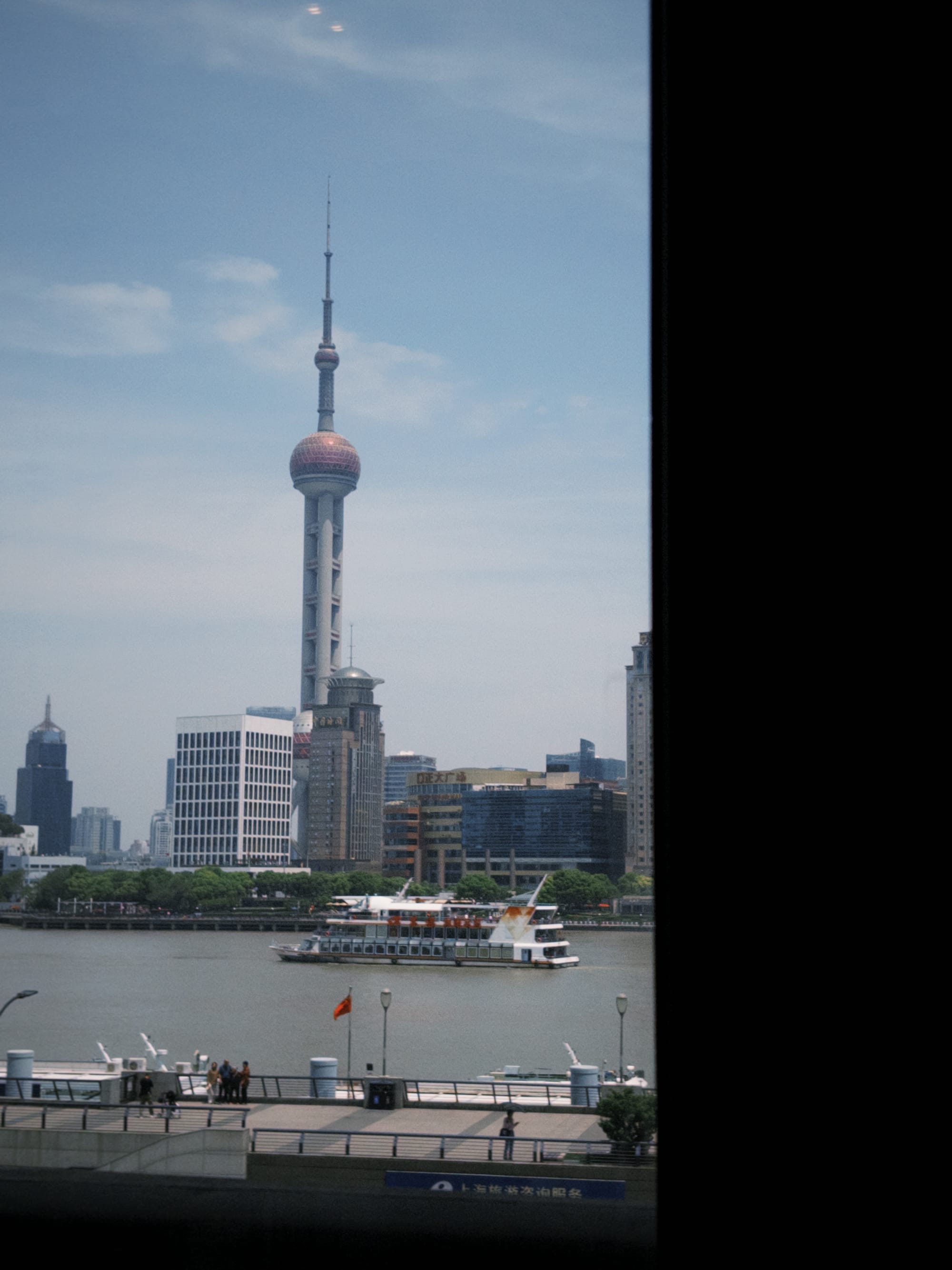 Sitting in a restaurant facing Huangpu River